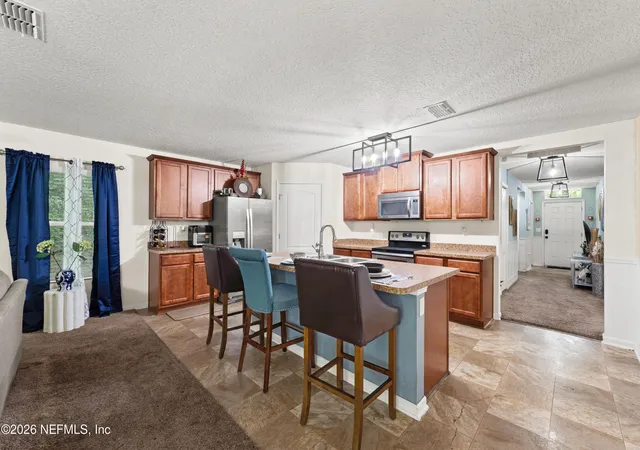 4th image of 8949 Oxfordshire Dr, Jacksonville, FL 32219 | MLS# 2148192