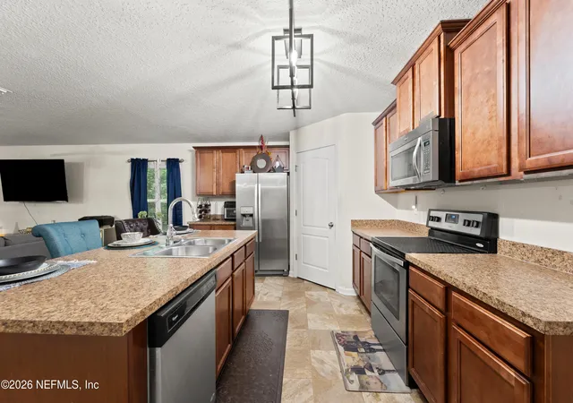 5th image of 8949 Oxfordshire Dr, Jacksonville, FL 32219 | MLS# 2148192