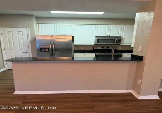 Photo 4 of Condo for sale at 8539 Gate Pkwy W #424, Jacksonville, FL 32216 | MLS# 2149383 | Listing updated on 2026-06-19