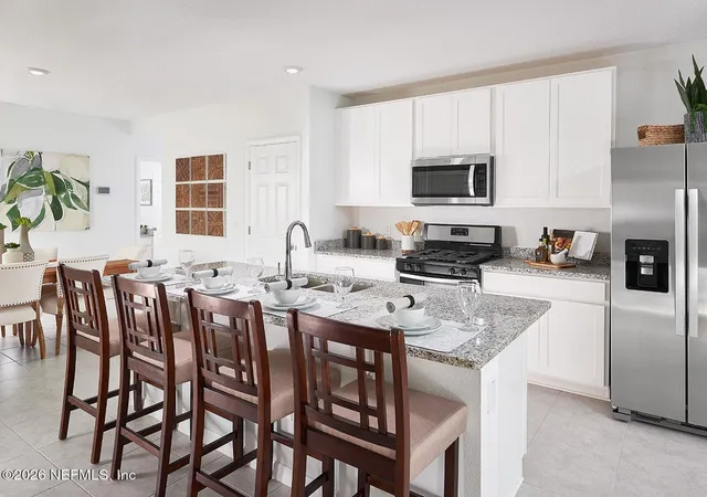 4th image of 102 Wandering Creek Wy, Palm Coast, FL 32164 | MLS# 2149895