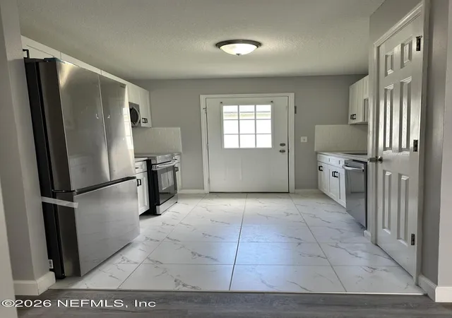 Photo 3 of Single family home for sale at 1394 Manotak Ave, Jacksonville, FL 32210 | MLS# 2149956 | Listing updated on 2026-09-15