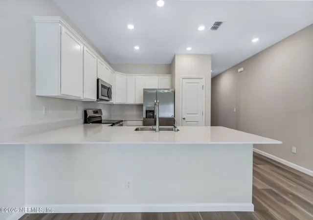 Photo 3 of Townhouse for sale at 704 Holly Lakes Dr, Orange Park, FL 32073 | MLS# 2152778 | Listing updated on 2026-10-09