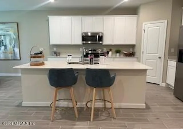 Photo 4 of Single family home for sale at 554 Avalon Woods Ln, Jacksonville, FL 32218 | MLS# 2152843 | Listing updated on 2026-10-04