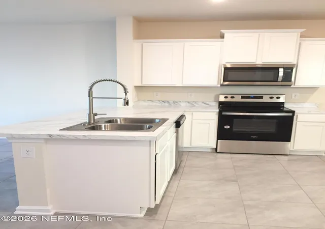 Photo 3 of Townhouse for sale at 7627 Legacy Trl, Jacksonville, FL 32256 | MLS# 2153412 | Listing updated on 2026-09-14