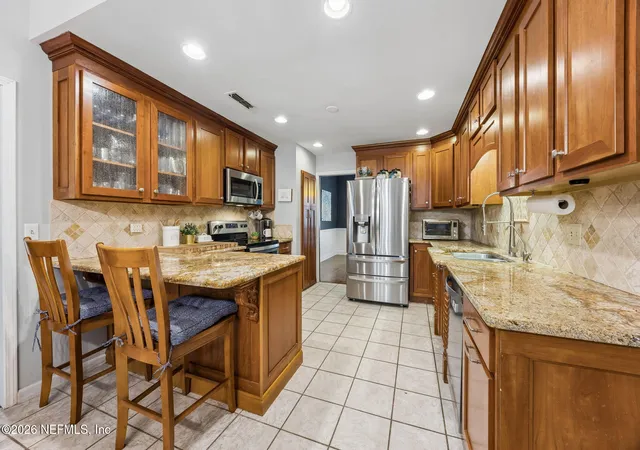 Photo 3 of Single family home for sale at 11563 Sedgemoore Dr, Jacksonville, FL 32223 | MLS# 2153810 | Listing updated on 2026-09-17
