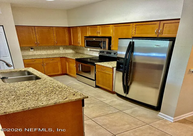 Photo 4 of Condo for sale at 10435 Midtown Pkwy #430, Jacksonville, FL 32246 | MLS# 2154294 | Listing updated on 2026-07-13