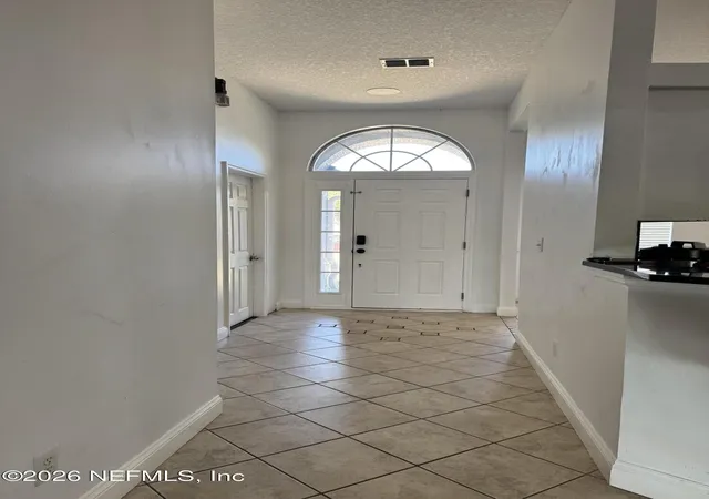 Photo 3 of Single family home for sale at 11908 Canterwood Dr N, Jacksonville, FL 32246 | MLS# 2154569 | Listing updated on 2026-09-11