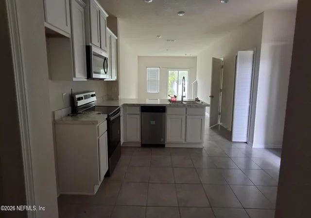 Photo 3 of Townhouse for sale at 834 Observatory Pkwy, Jacksonville, FL 32218 | MLS# 2154942 | Listing updated on 2026-07-11