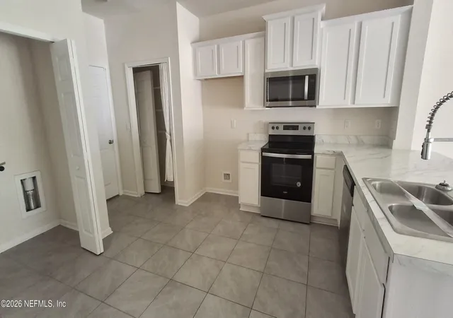 Photo 4 of Townhouse for sale at 834 Observatory Pkwy, Jacksonville, FL 32218 | MLS# 2154942 | Listing updated on 2026-07-11
