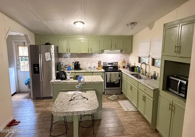 Photo 4 of Manufactured home for sale at 4449 Dalry Dr, Jacksonville, FL 32246 | MLS# 2161649 | Listing updated on 2026-09-17