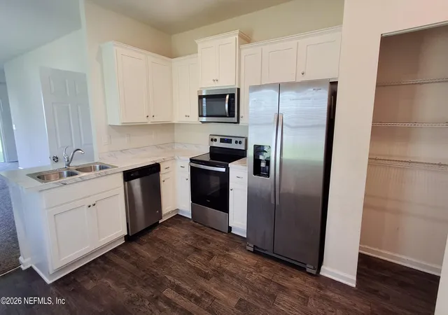 Photo 4 of Townhouse for sale at 878 Capitol Pkwy, Jacksonville, FL 32218 | MLS# 2162262 | Listing updated on 2026-09-16