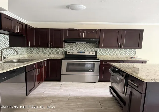 Photo 2 of Condo for sale at 4321 Plaza Gate Ln S #202, Jacksonville, FL 32217 | MLS# 2162484 | Listing updated on 2026-09-11
