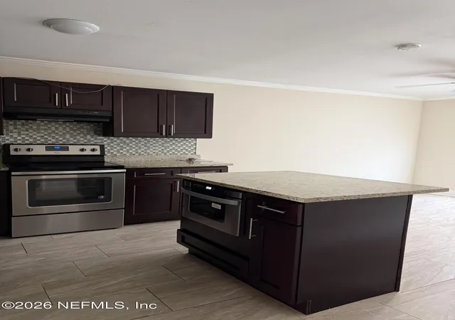 Photo 3 of Condo for sale at 4321 Plaza Gate Ln S #202, Jacksonville, FL 32217 | MLS# 2162484 | Listing updated on 2026-09-11