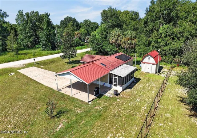 Photo 3 of Manufactured home for sale at 100 Musket Dr, Satsuma, FL 32189 | MLS# 2162721 | Listing updated on 2026-09-09