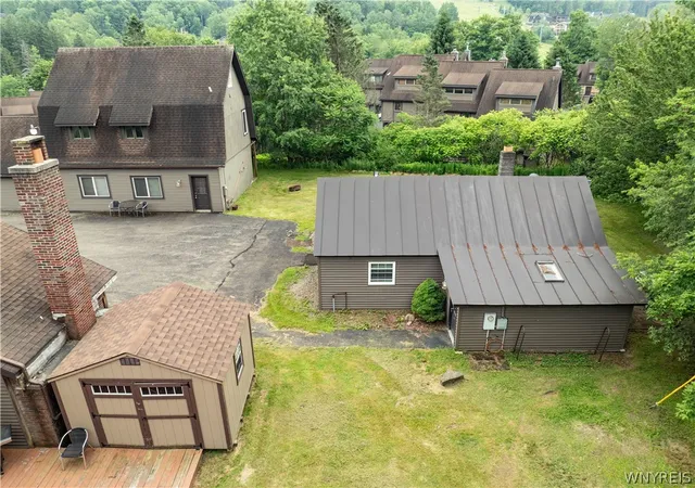 Photo 4 of Multi family home for sale at 6979 Nys Route 242 W, Ellicottville, NY 14731 | MLS# B1514343 | Listing updated on 2026-07-27