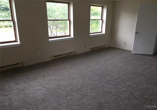 Listing Photo 2 - Condo for sale in building located at 20 Park Ave, Lacona, NY 13083 - Unit #