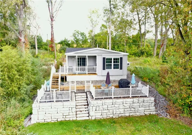 Photo 1 of Manufactured home for sale at 7023 River Rd, Cayuga, NY 13034 | MLS# S1640300 | Listing updated on 2026-06-07