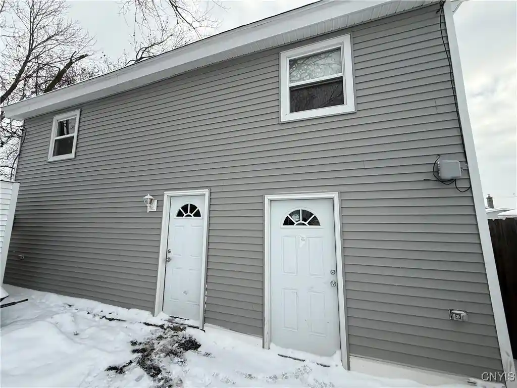 Listing Photo 1 - Condo for sale in 125 W 1st St located at 125 W 1st St, East Syracuse, NY 13057 - Unit 125 W 1st Street