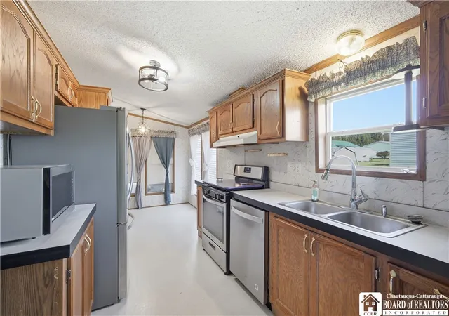 Photo 3 of Manufactured home for sale at 4911 Baker St Lot 15 Ext, Ashville, NY 14710 | MLS# R1682890 | Listing updated on 2026-07-22