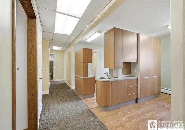 Listing Photo 2 - Condo for sale in building located at 70 E Fairmount Ave, Lakewood, NY 14750 - Unit #