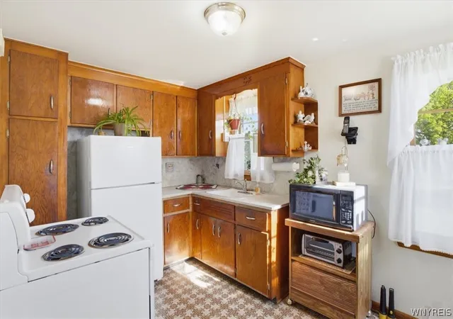 Photo 4 of Sale Pending at 12 Tussing Ln, Tonawanda, NY 14150 | MLS# B1686850 | Listing updated on 2026-07-07