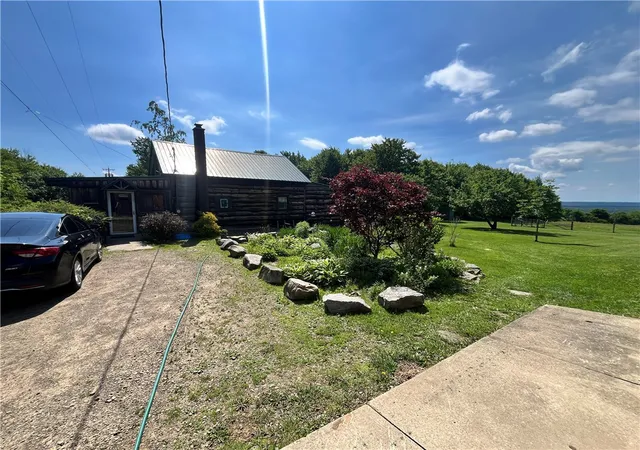 Photo 2 of Single family home for sale at 882 Alma Hl Rd, Wellsville, NY 14895 | MLS# R1691312 | Listing updated on 2026-07-30