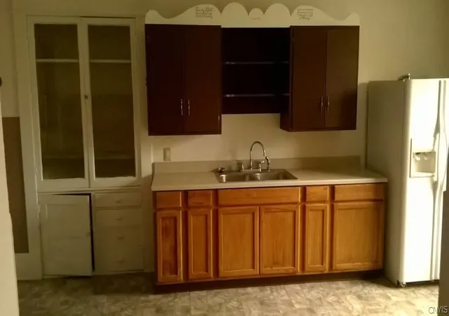 Listing Photo 2 - Condo for sale in building located at 73 E Genesee St, Auburn, NY 13021 - Unit #