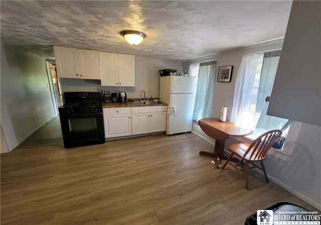 Listing Photo 2 - Condo for sale in building located at 48 Thayer St, Jamestown, NY 14701 - Unit #