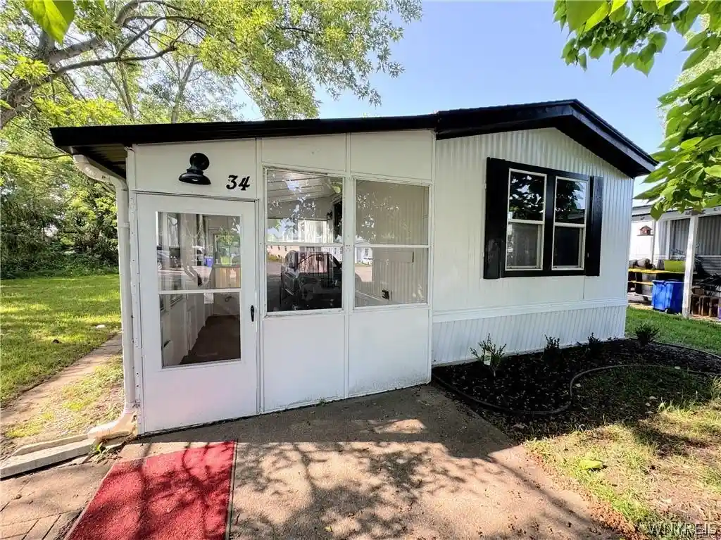 Photo 1 of Manufactured home for sale at 34 Del Ct W, Lockport, NY 14094 | MLS# B1719923 | Listing updated on 2026-10-16