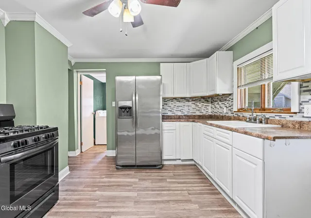 3rd image of 62 Center St, Amsterdam, NY 12010 | MLS# 202619202