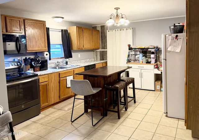 Photo 4 of Single Family Residence at 6 Mechanic St, Corinth, NY 12822 | MLS# 202621740 | | Sold on 2026-10-01