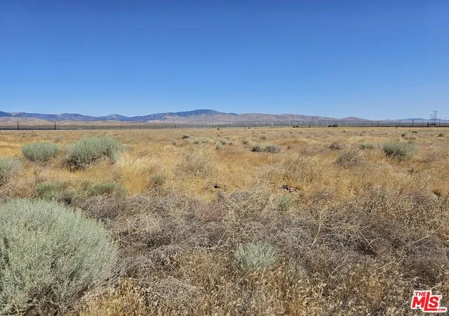 Photo 1 of Land for sale at 165   E Street And Avenue A, Rosamond, CA 93560 | MLS# 24414427 | Listing updated on 2026-05-22
