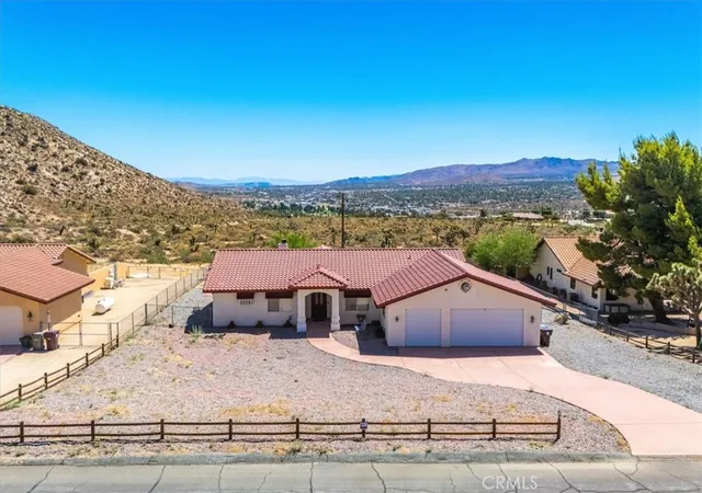 Photo 1 of Single family home for sale at 7495 Canyon Dr, Yucca Valley, CA 92284 | MLS# JT24175742 | Listing updated on 2026-09-30