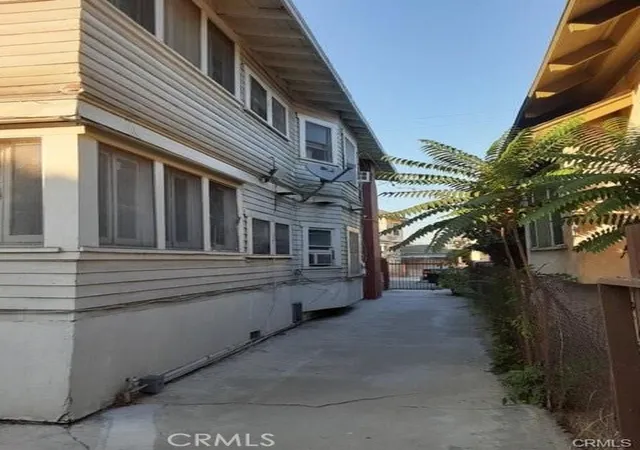 Photo 7 of Multi family home for sale at 1038 W 21st Street, Los Angeles, CA 90007 | MLS# CV25101490 | Listing updated on 2026-10-03