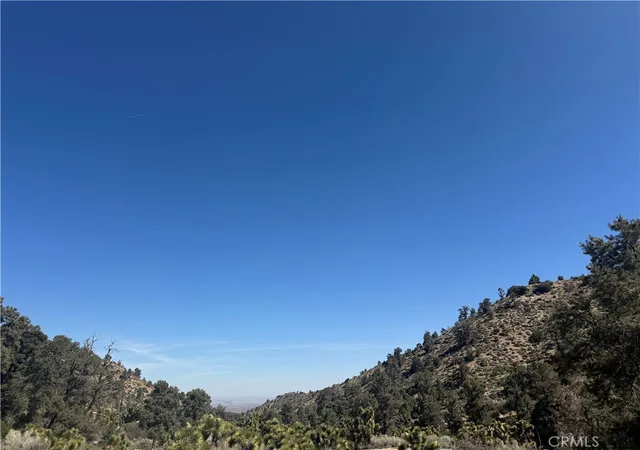 Photo 1 of Land for sale at 40124 Scenic Crk, Pinon Hills, CA 92372 | MLS# HD25109128 | Listing updated on 2026-04-08