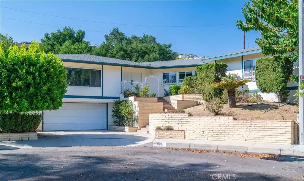 Single family home for sale at 211 Peacock Ln, Montebello, CA 90640 | MLS# WS25154669