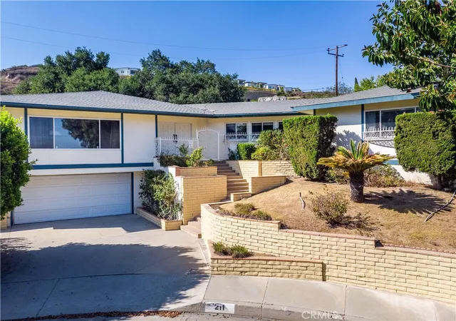 Photo 2 of Single family home for sale at 211 Peacock Ln, Montebello, CA 90640 | MLS# WS25154669 | Listing updated on 2026-09-25