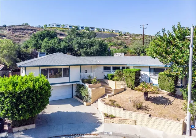 Photo 3 of Single family home for sale at 211 Peacock Ln, Montebello, CA 90640 | MLS# WS25154669 | Listing updated on 2026-09-25