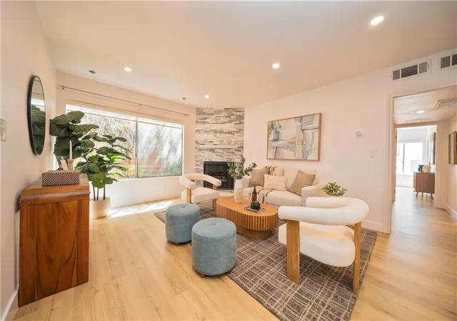 Listing Photo 1 - Condo for sale in building located at 1827 Greenfield Ave, Los Angeles, CA 90025 - Unit #108