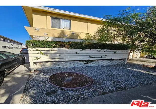 Photo 3 of Multi family home for sale at 3125 S Durango Ave, Los Angeles, CA 90034 | MLS# 25610087 | Listing updated on 2026-05-28