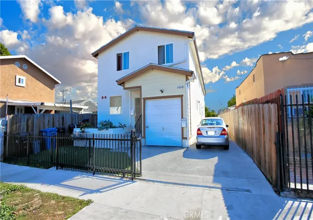 Photo 1 of Multi family home for sale at 1566 E 106th Street, Los Angeles, CA 90002 | MLS# CV25260577 | Listing updated on 2026-05-09