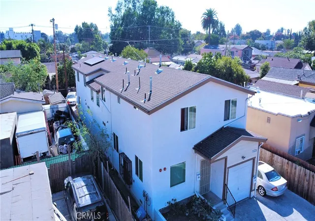 Photo 3 of Multi family home for sale at 1566 E 106th Street, Los Angeles, CA 90002 | MLS# CV25260577 | Listing updated on 2026-05-09