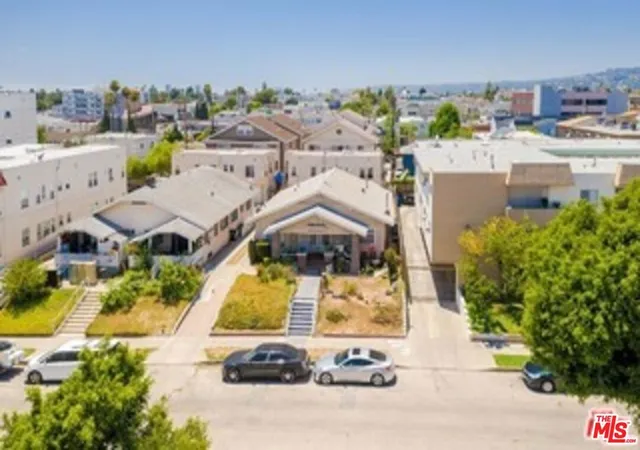 Photo 1 of Multi family home for sale at 423 N Serrano Ave, Los Angeles, CA 90004 | MLS# 25620973 | Listing updated on 2026-03-26