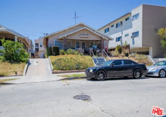 Photo 4 of Multi family home for sale at 423 N Serrano Ave, Los Angeles, CA 90004 | MLS# 25620973 | Listing updated on 2026-03-26