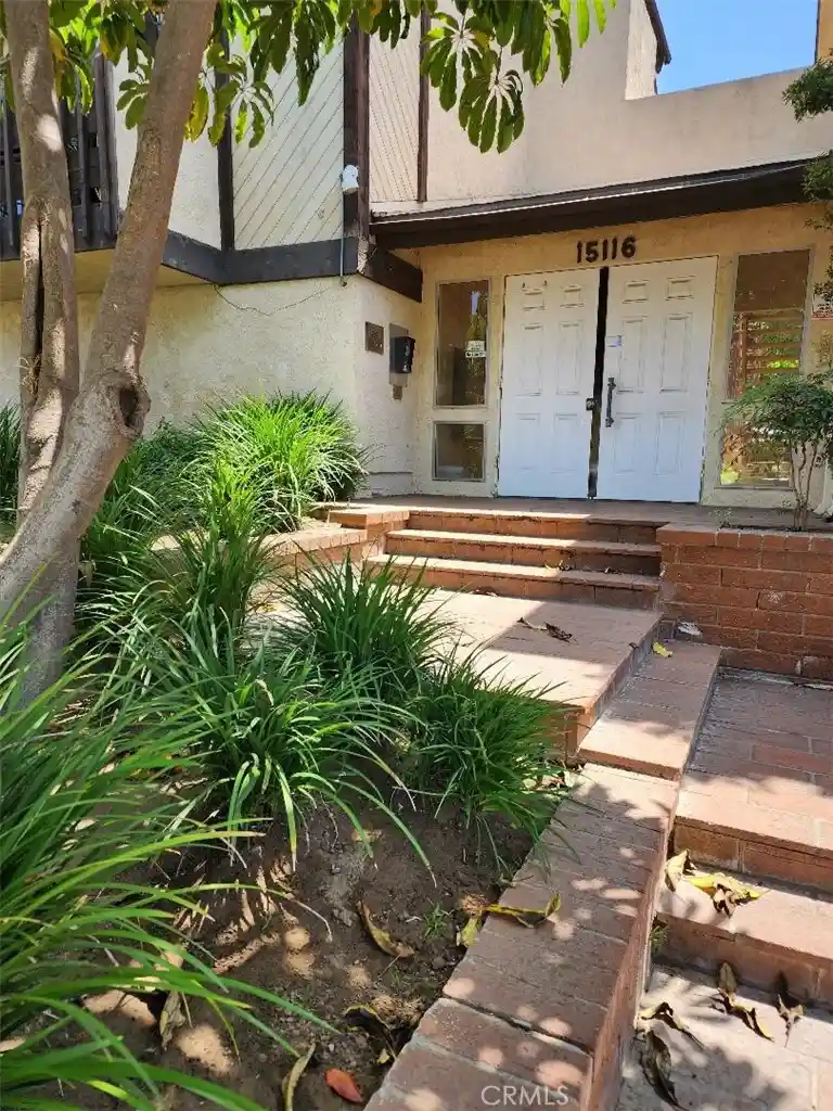Listing Photo 1 - Condo for sale in 15116 S Raymond Ave located at 15116 S Raymond Ave, Gardena, CA 90247 - Unit #104