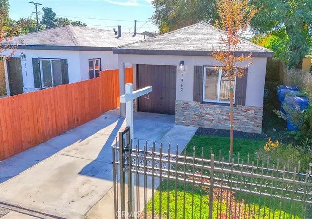 Photo 1 of Sale Pending at 1962 E 114th Street, Los Angeles, CA 90059 | MLS# DW26002743 | Listing updated on 2026-02-13