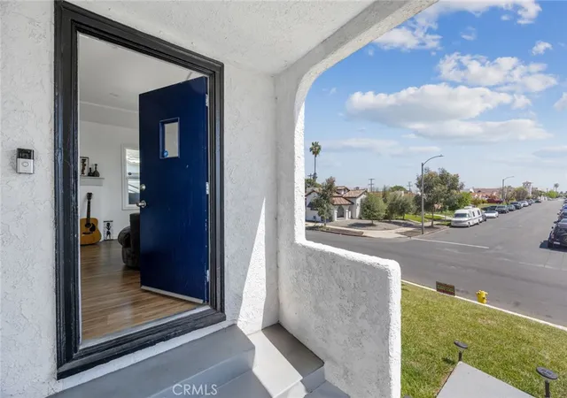 Photo 3 of Single family home for sale at 7037 Cimarron St, Los Angeles, CA 90047 | MLS# DW26005307 | Listing updated on 2026-09-30