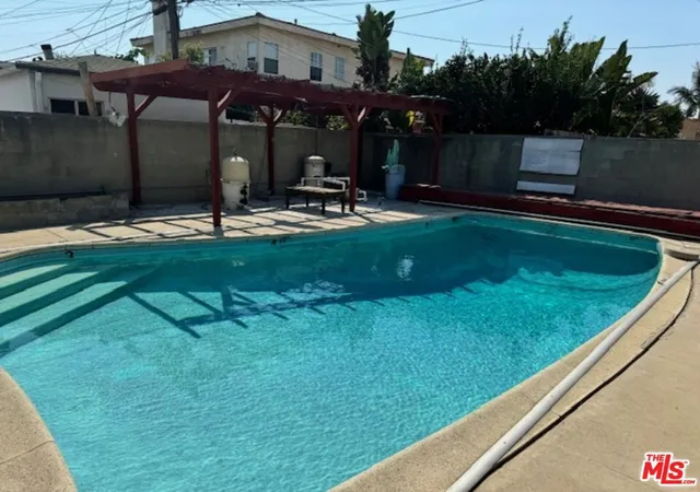 Photo 3 of Multi family home for sale at 2201 S Ridgeley Dr, Los Angeles, CA 90016 | MLS# 26655111 | Listing updated on 2026-06-11