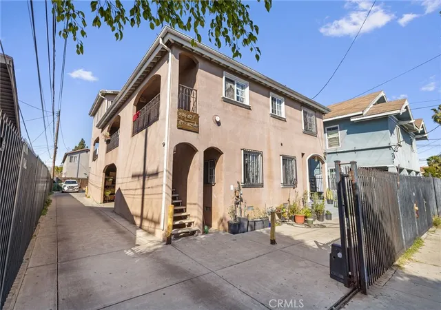 1st image of 879 E 40th Pl, Los Angeles, CA 90011 | MLS# OC26053122