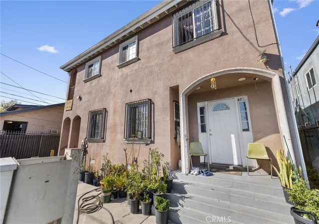 Photo 3 of Multi family home for sale at 879 E 40th Place, Los Angeles, CA 90011 | MLS# OC26056394 | Listing updated on 2026-09-11